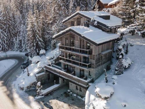 Courchevel Ski Chalet | Chalet de luxe à Courchevel avec piscine et personnel 15 pers - FR-1-562-71
