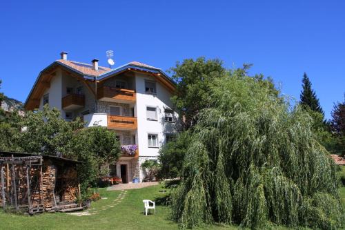 Fai della Paganella Apartment | Cortalta Mountain Lodge - Appartamento Ciliegio piano terra con giardino