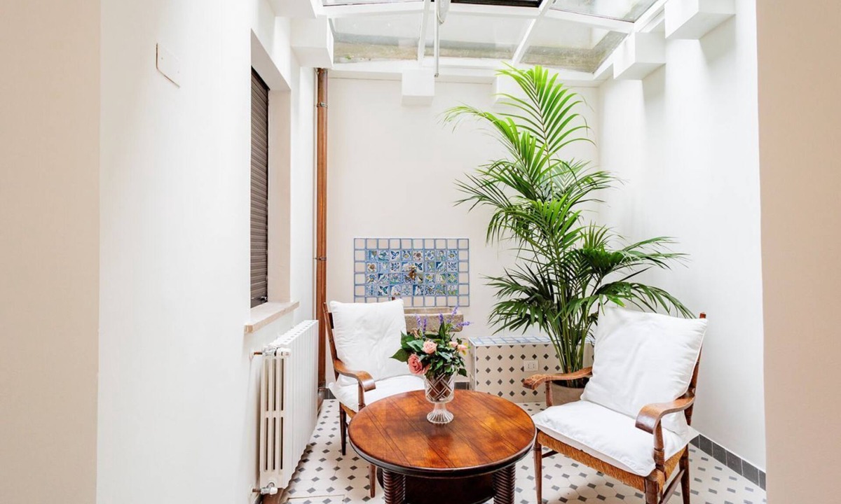 Bergamo Apartment | GuestHost - Spacious 100 sqm apartment in the Santa Lucia district of Bergamo, ideal for 4 people. Equipped with air conditioning and wifi, it features an elegant winter garden, perfect for enjoying natural light all year round. Located in a quiet and