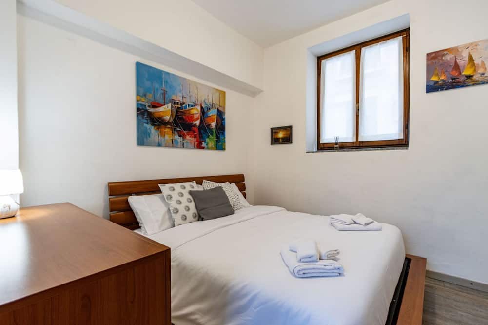 Dormelletto Apartment | SoleLago - Dormelletto, Garden, Patio, Barbecue, Sleeps 5, WiFi, Air Conditioning