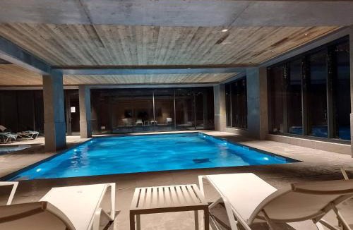 Arc-1600 Apartment | Appart cosy 3 pièces, ski-in/out, piscine & spa, 8-10 pers. - FR-1-461A-26