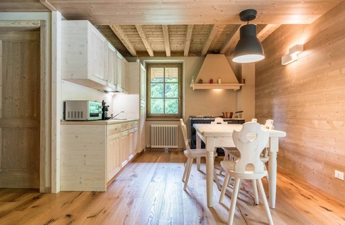 Pelugo Ski Chalet | Beautiful “Chalet dell'Orso” with Wi-Fi, Jacuzzi, and Private Garden