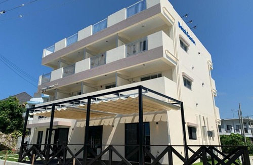 Maeganeku Apartment | Blue Entrance
