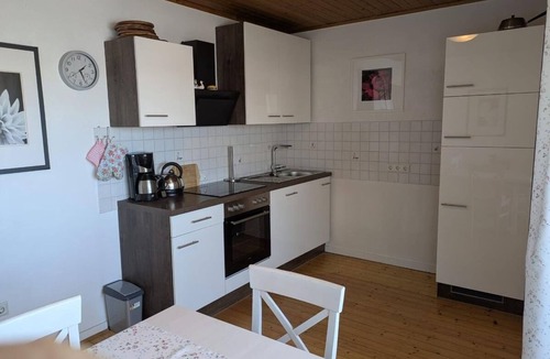 Hallenberg Apartment | Bright apartment (81sqm) with wood-burning stove and balcony with view