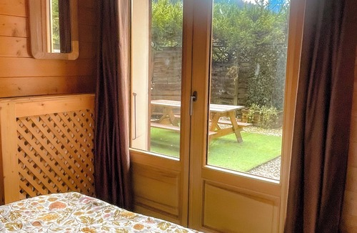 La Clusaz Apartment | Chalet-style apartment—3 rooms, 2 bedrooms, ground floor, small garden, parking—3 minutes from the base of the slopes, near the center