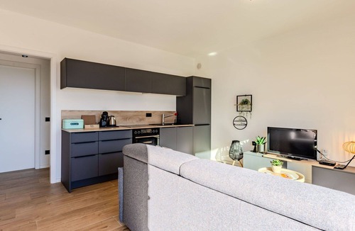 Gera Lario Apartment | Cosy apartment for 4 guests with WIFI, pool, TV and terrace