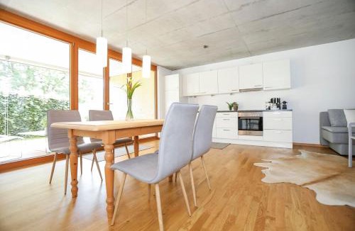 Klaus Apartment | Gartenwohnung in prämierter Wohnanlage Nachhaltige Kühlung über Erdsonde und Fussbodenkühlung