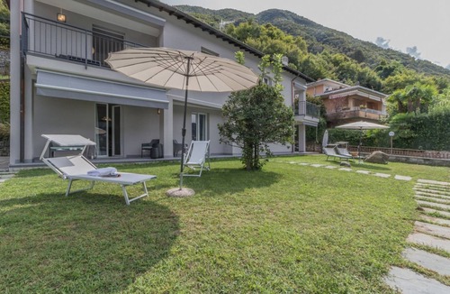 Lezzeno Apartment | GuestHost - Comfortable 70 sqm apartment, perfect for a stay of two people, located on the ground floor of a building with lake views.The property is located in Lezzeno (Frazione Carvagnana), an area full of services and equipped with every comfort.The a