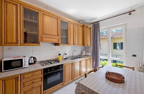 Porlezza House | Holiday Home 'Ezia' with Mountain View and Small Private Garden