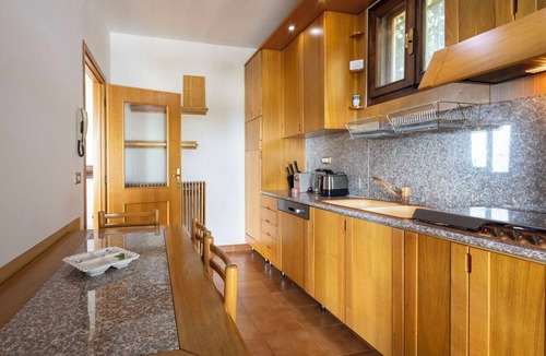 Costa Volpino Apartment | Lovely apartment for 4 guests with WIFI, TV, terrace and pets allowed