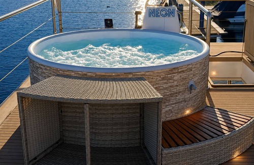 Sesto Calende Boat Rental | Neon House Boat—Luxury Stay on Lake Maggiore with a Hot Tub