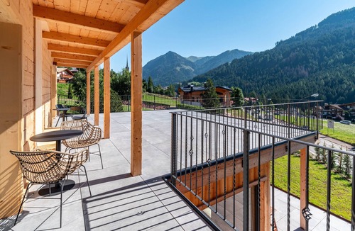 Vigo di Fassa Apartment | Noah Suites Neve Apartment with Mountain View, Private Terrace and Wi-Fi