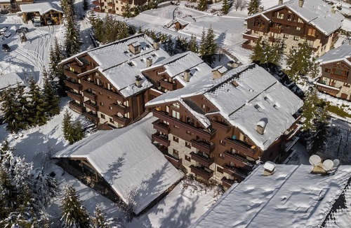 Meribel Village Apartment | Ski-in apartment with pool access and covered parking