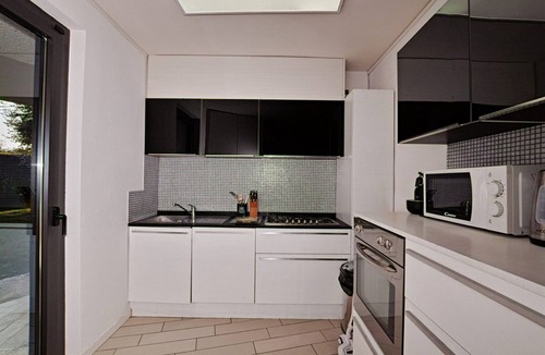 Manerba del Garda Villa | Villa "Grazia" with Wi-Fi, Garden, Terrace, Pool Gym & Sauna