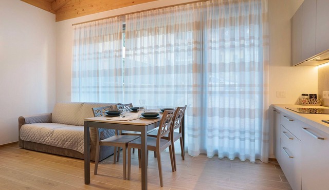 Apartment 'Appartamento Chiara Tione' with Private Garden and Wi-Fi