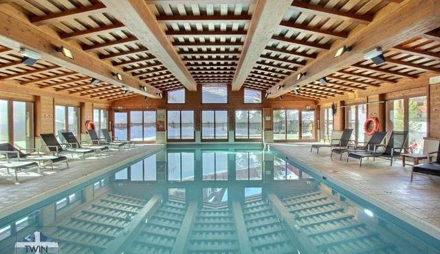 ARC 1950 - Appartement 10 personnes Duplex Cheminée - ski aux pieds - Sauna, Hammam, Jacuzzi