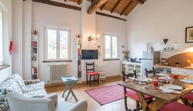 GuestHost - Confortable and stylish 90smq duplex apt that can accomodate up to 4 people located in a period building without a lift.Portion of private garden, large garden with shared pool and private parking space.Inside the building there is a historic