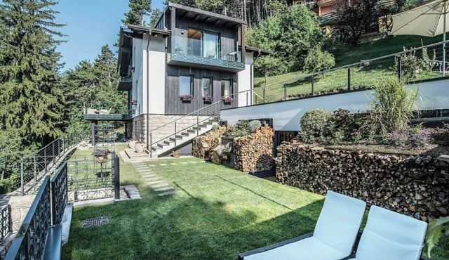 Trentino house with garden in Fai della Paganella