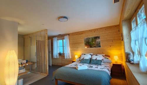 Chambre double Deluxe avec salle de bain privative.